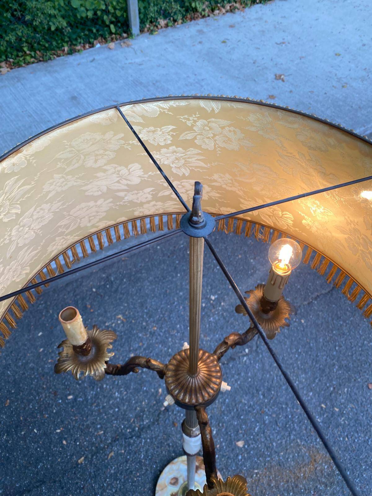 Vintage brass onyx floor lamp with fringed shade.