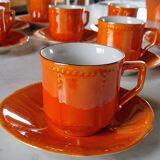 Iridescent orange porcelain coffee set from the 50s-60s with black edging