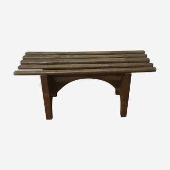 Small bench or old stool with slats