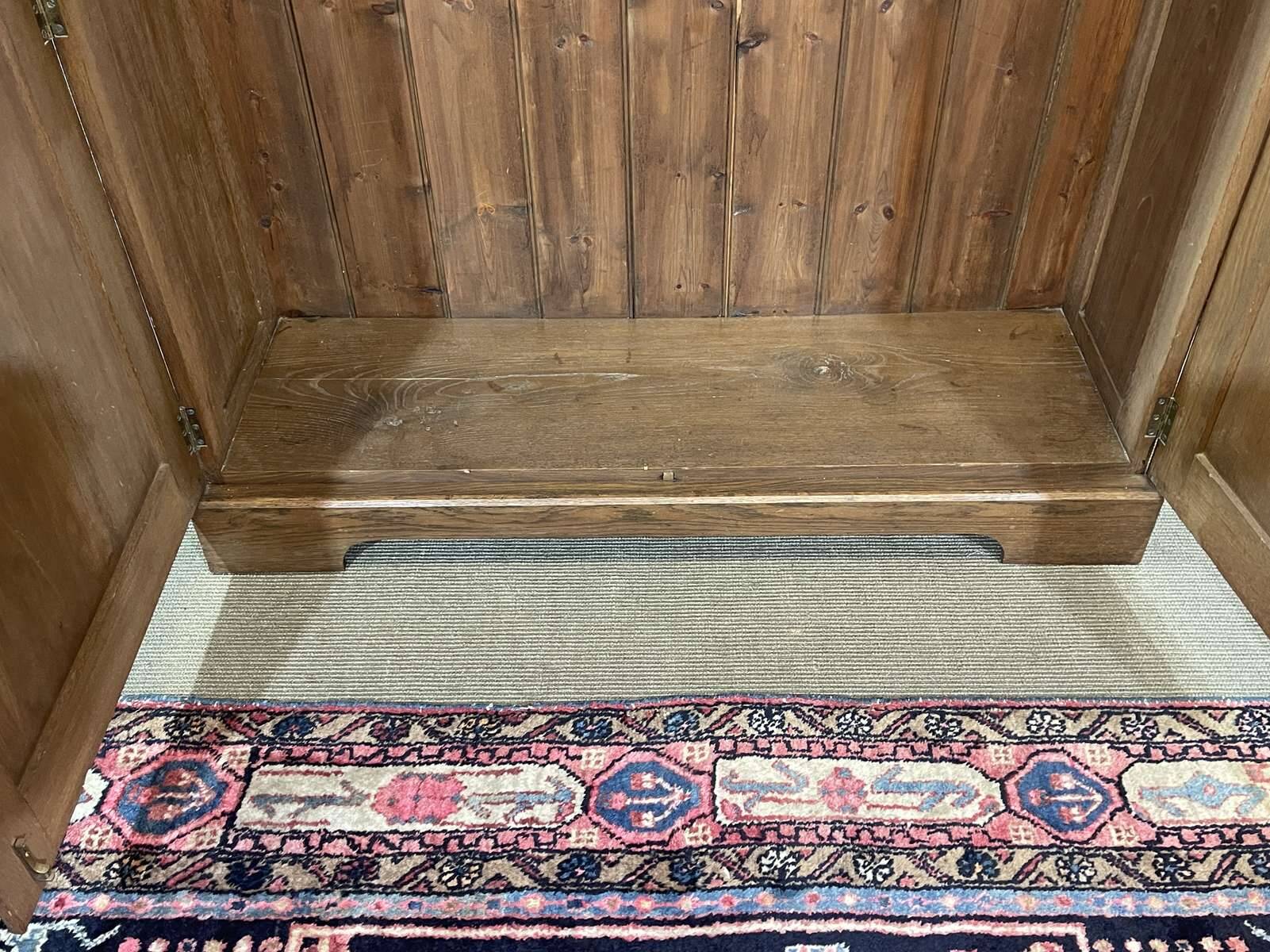 English oak wardrobe from the early 20th century.