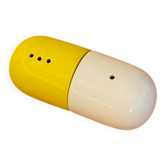 Kitsch salt and pepper shakers in the shape of a medicine capsule.