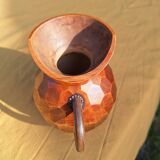 Small faceted wooden pitcher