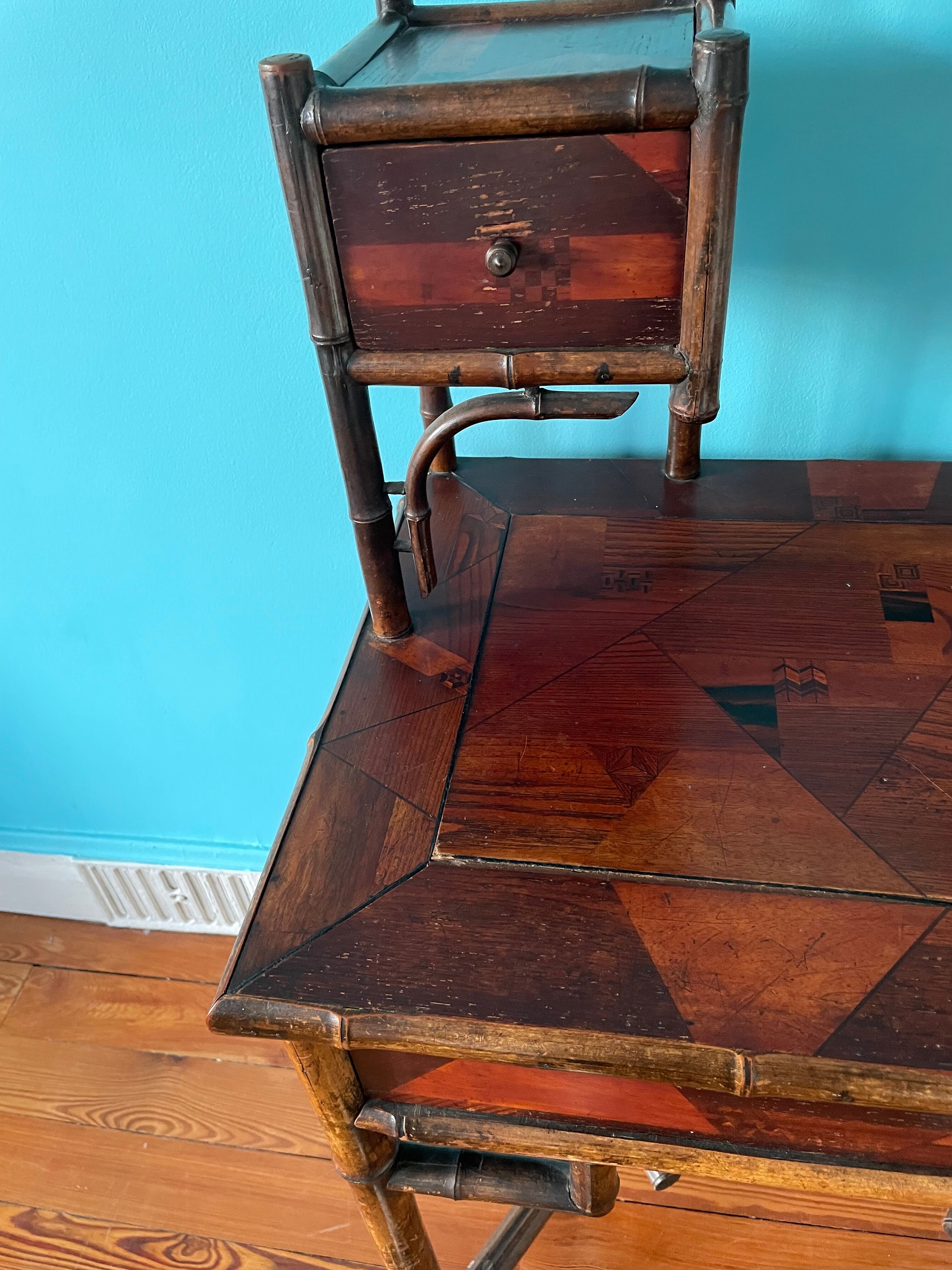 Old secretary in marquetry and bamboo