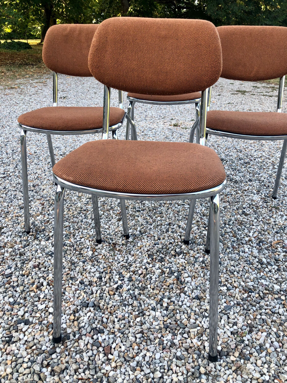 Chromed metal and wool chairs