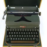 Hermes 2000 portable typewriter with its carrying suitcase