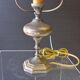 Very pretty lamp in tin with an opaline glass globe in very good condition.