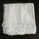Old linen tablecloth with crocheted frills.