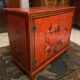 Low sideboard with lacquered decoration with birds on orange background Far East China Japan