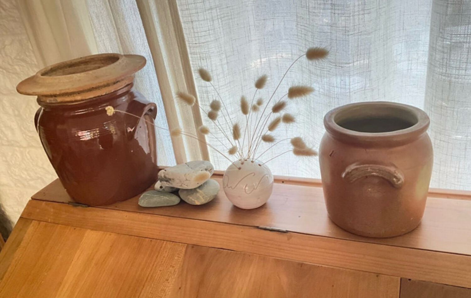Ancient ceramic salt cellar and its lid.