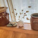 Ancient ceramic salt cellar and its lid.