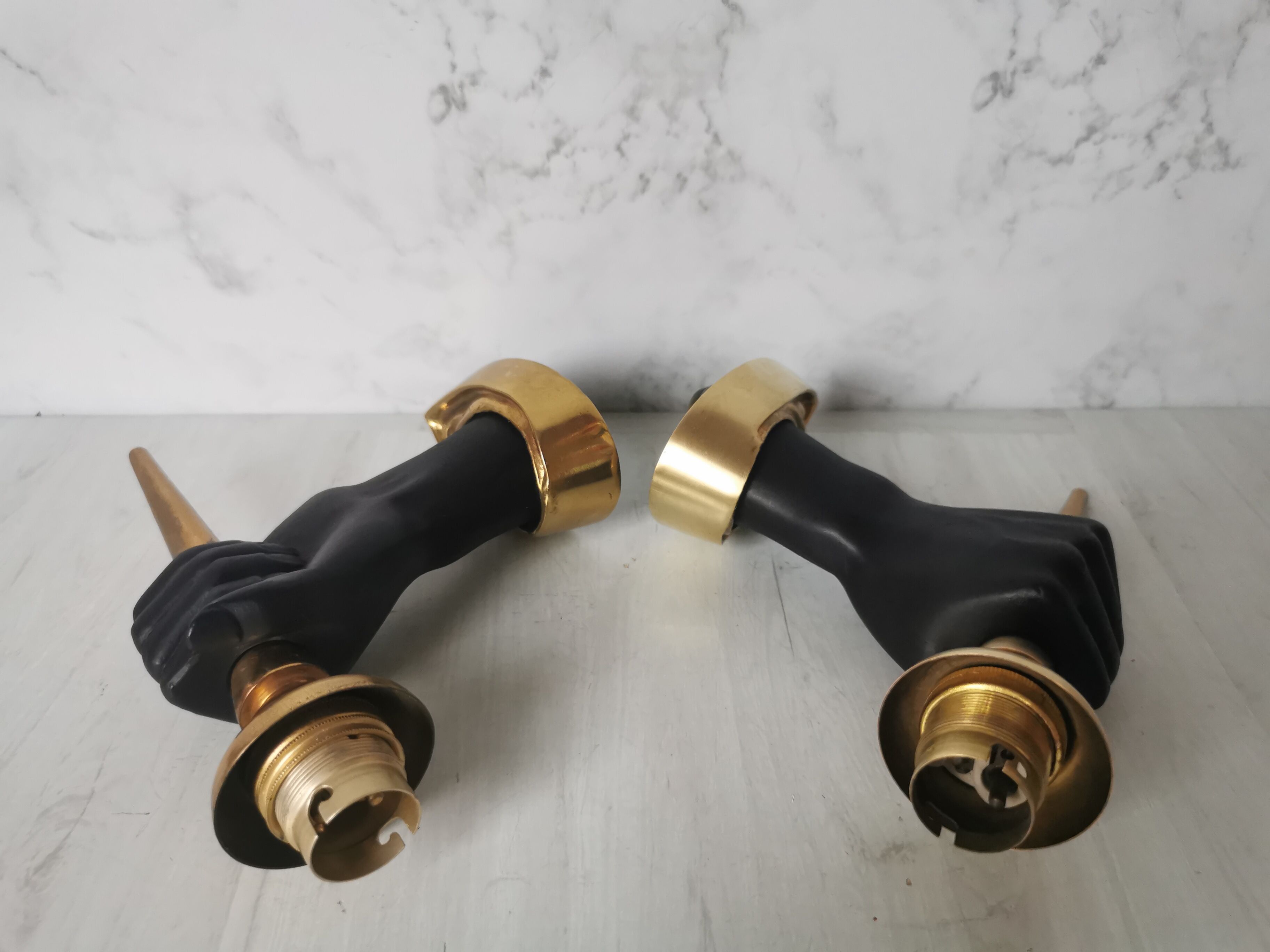 Pair of brass hand flare appliques