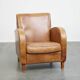 Fauteuil design en cuir de vachette couleur cognac clair