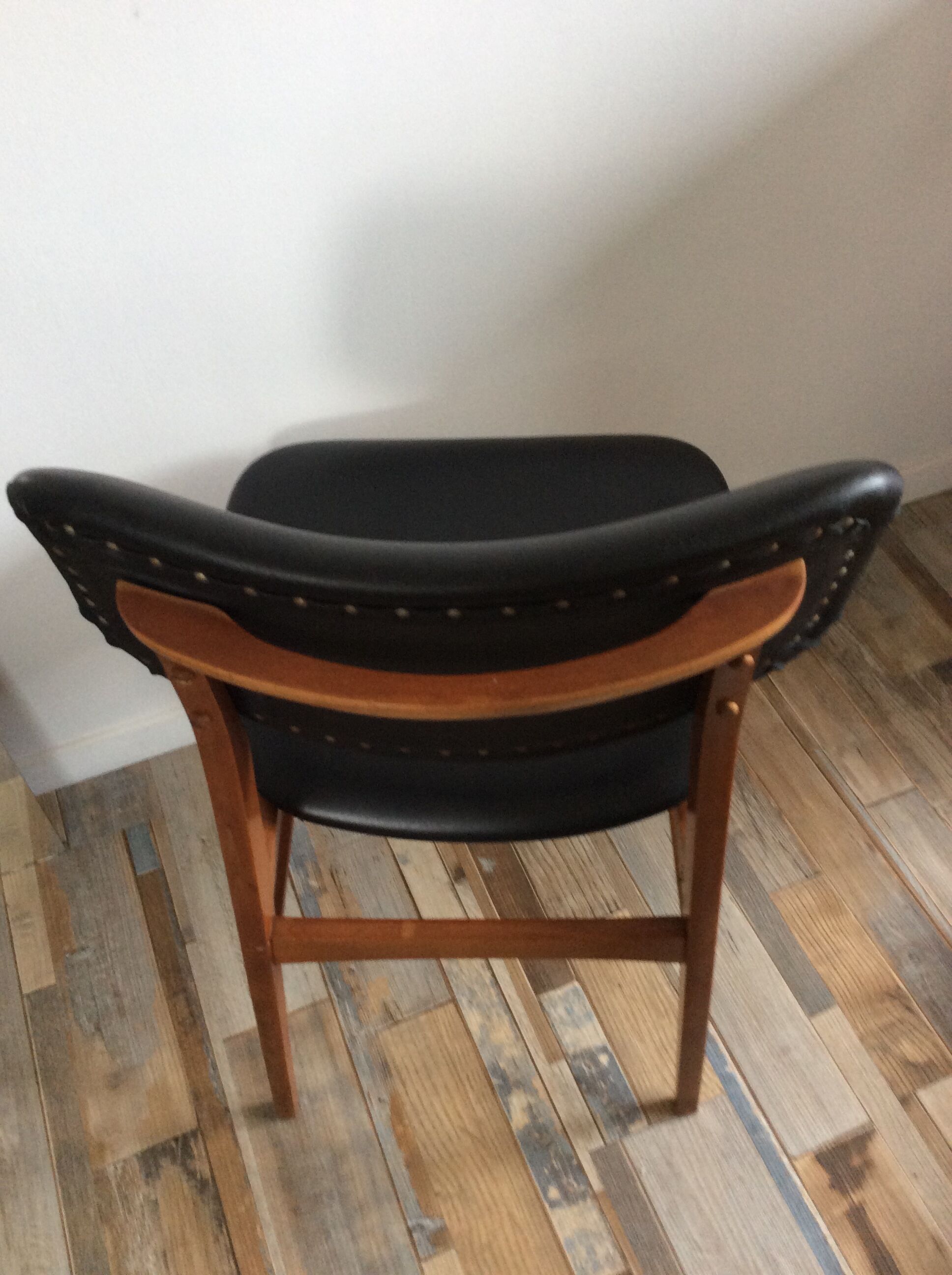 Scandinavian chair of the 60s in teak and black skaï