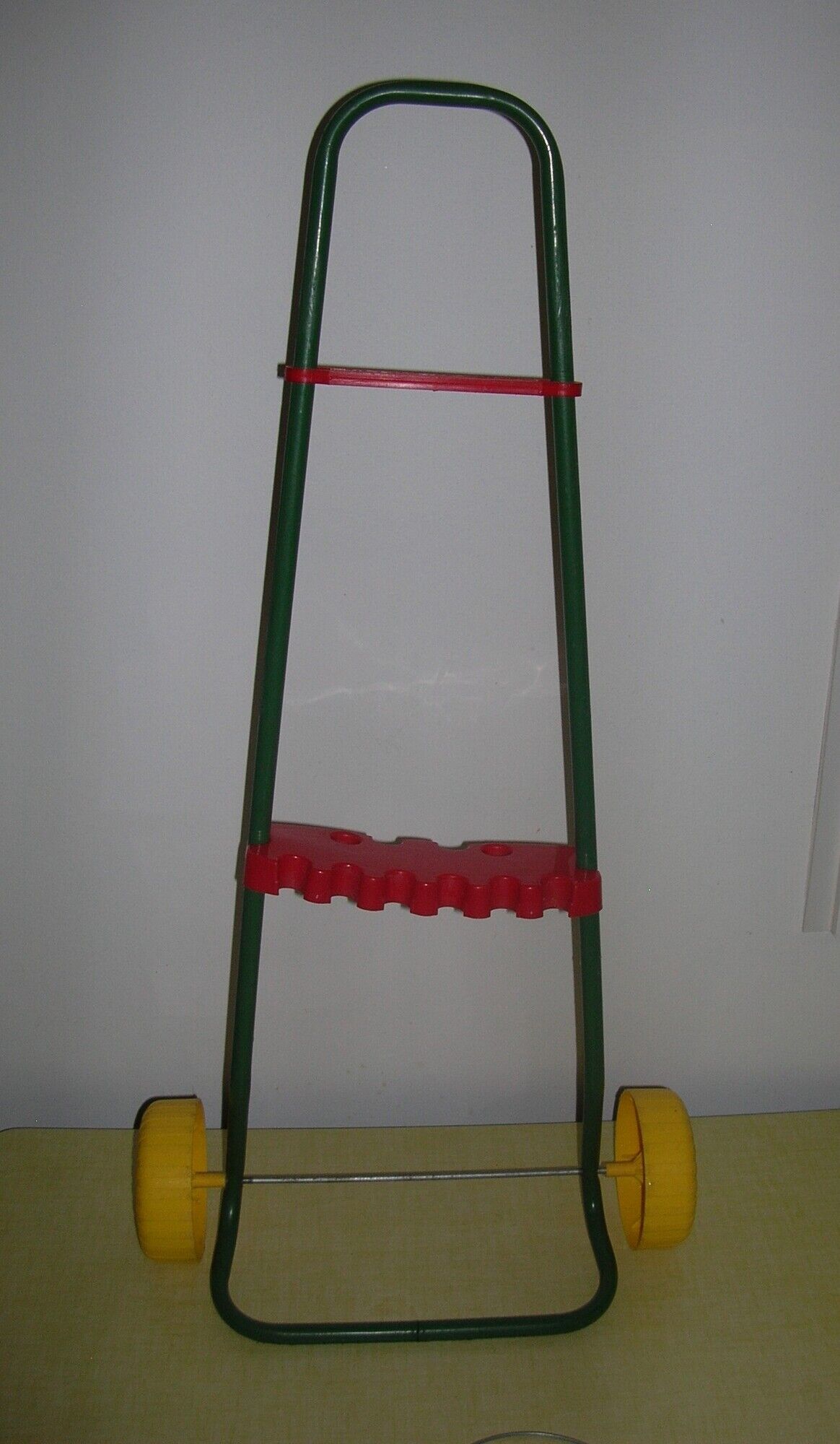 Wooden garden croquet game in its metal cart