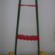 Wooden garden croquet game in its metal cart