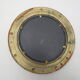 Mirror integrated into a brass navy porthole