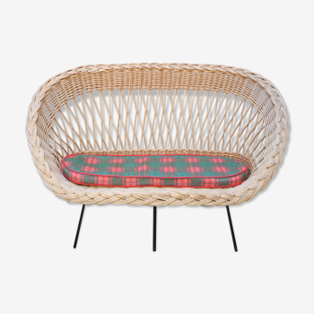 Bench into rattan of the 60s