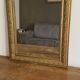 Miroir Louis Philippe fin 19ème. Doré. 75x56.