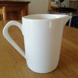 White pitcher in faience