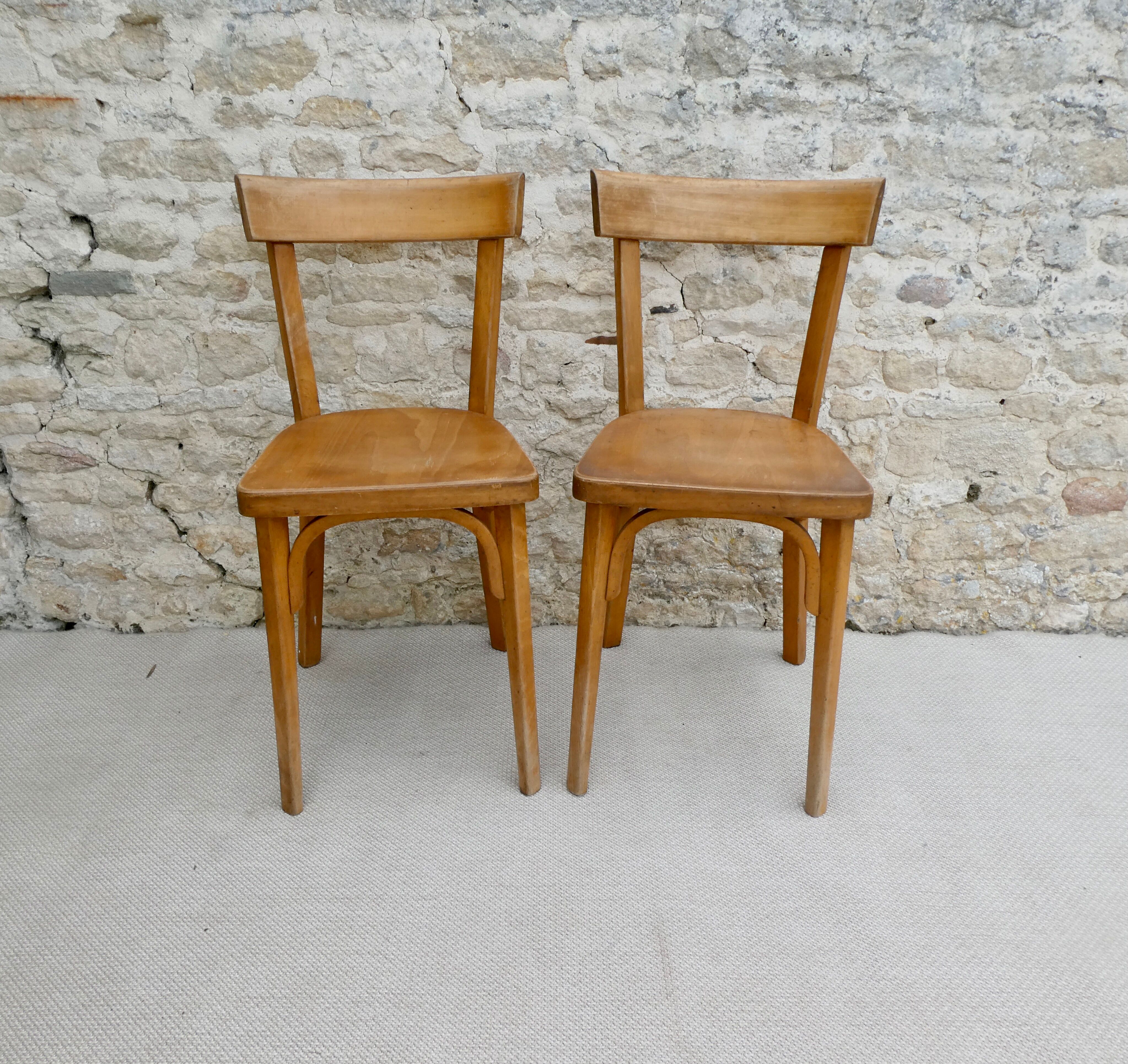 Pair of Baumann bistro chairs in light wood