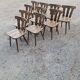 Serie de 10 chaises bistrot vintage en bois massif
