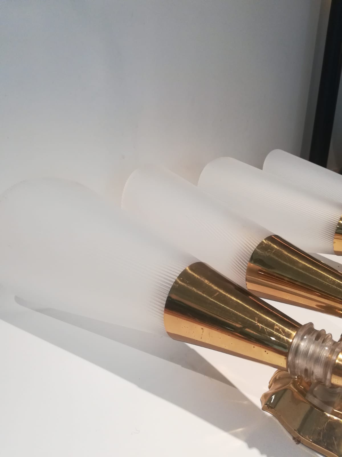 Pair of double wall sconces-corrugated plastic brass