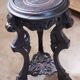 Antique carved side table with Indochinese inspiration, made of blackened wood
