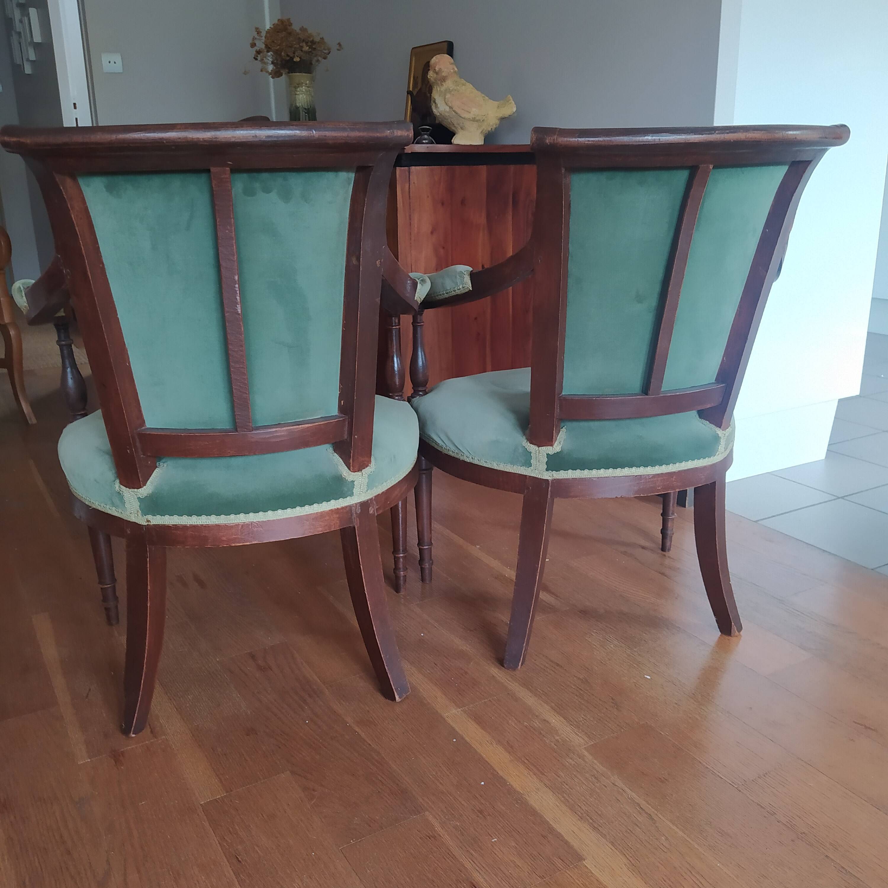 pair of Directoire armchairs in walnut, early 19th century, green velvet