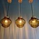 Set of 3 amber glass pendant lights, RAAK Amsterdam, 1970