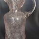 Small blown glass pitcher with bubbles from the 20th century.