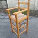 Chaise haute enfant paillée et bois vintage