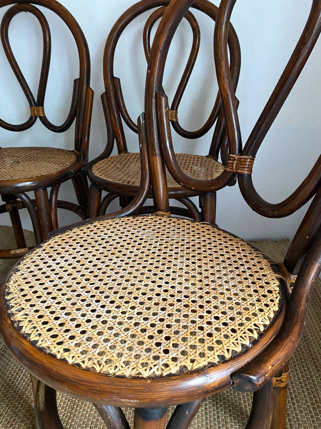 Rattan and cane bistro chairs