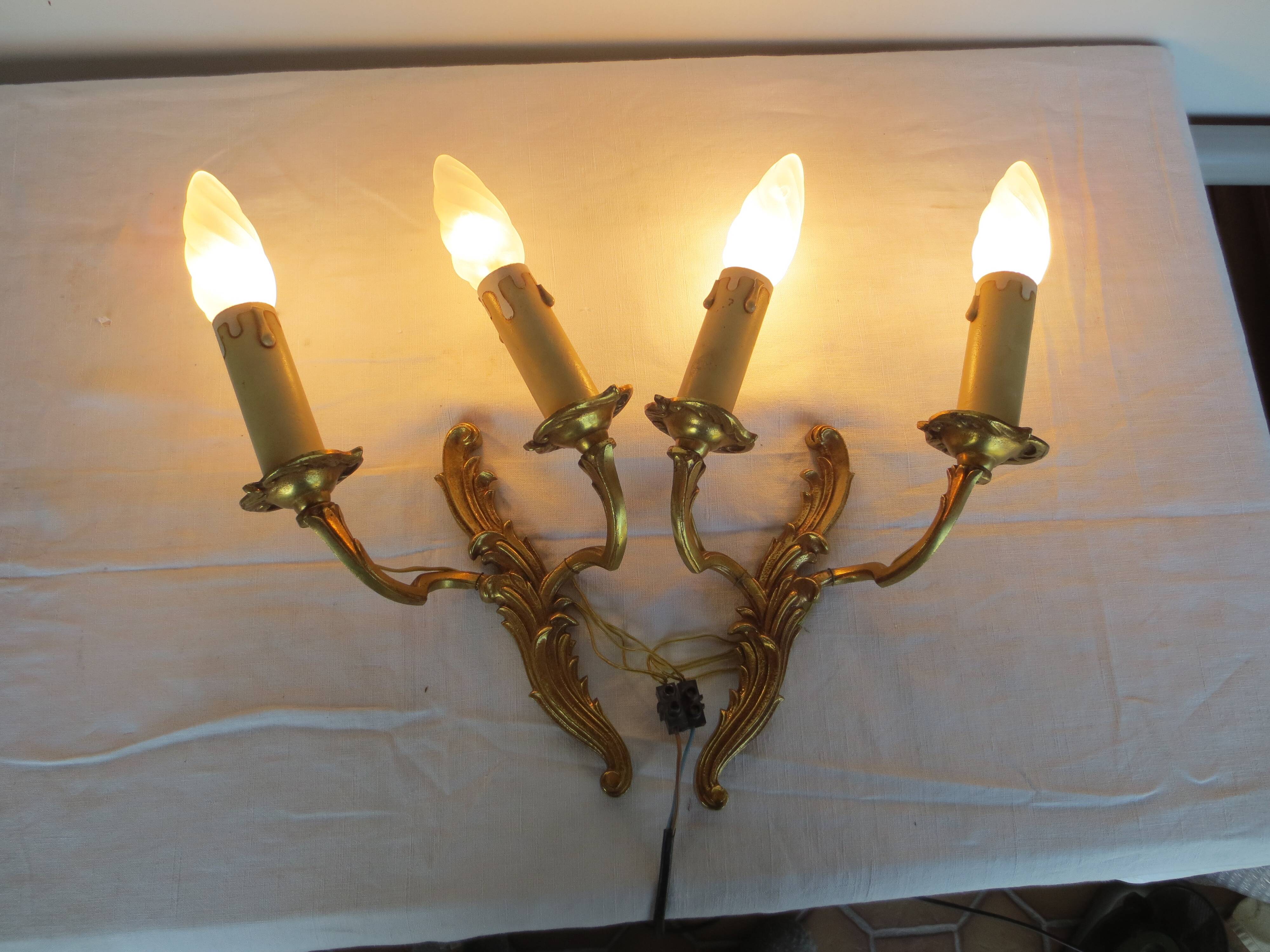 Pair of double wall lights in gilded bronze