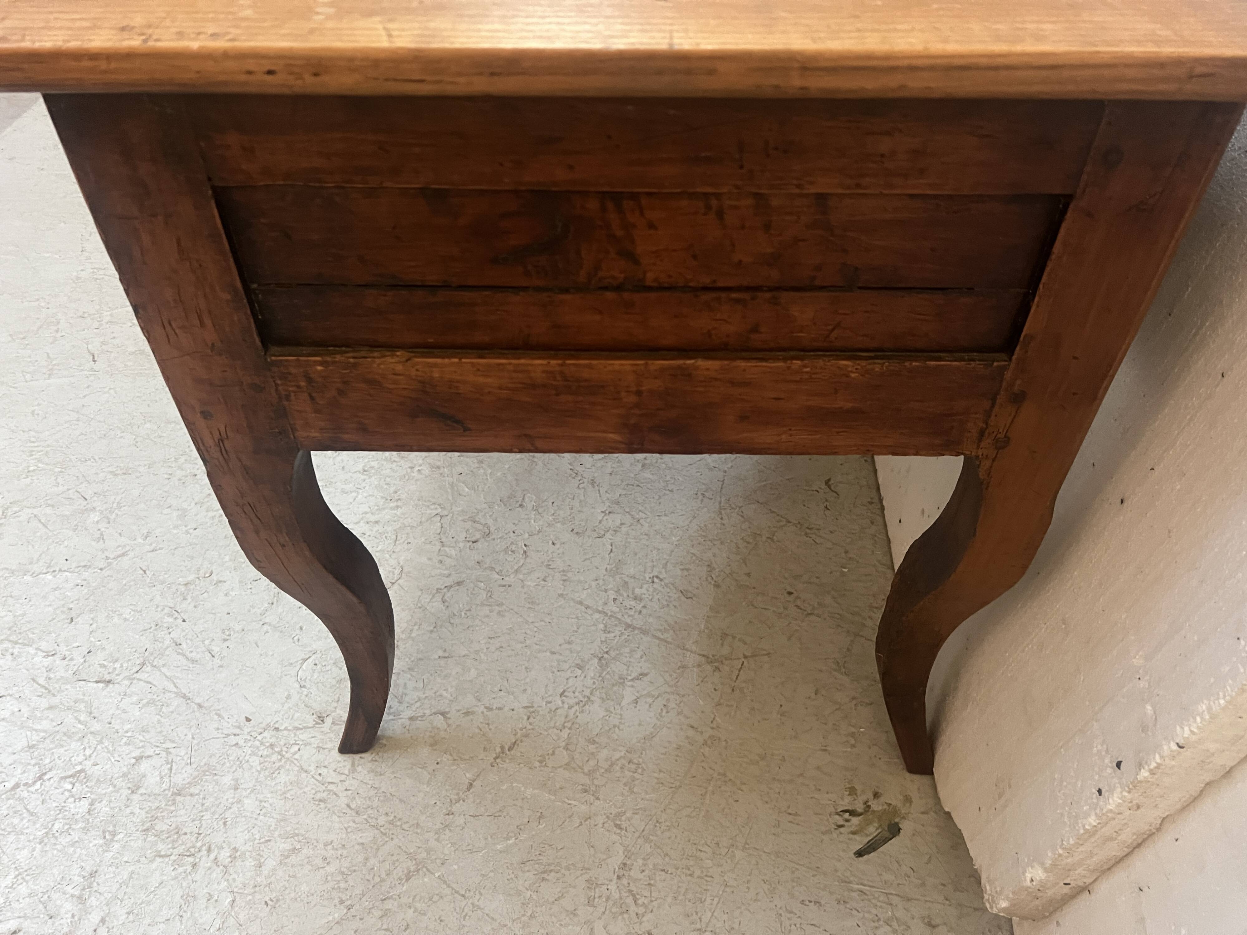 Provincial desk made of solid cherry wood, 20th century.