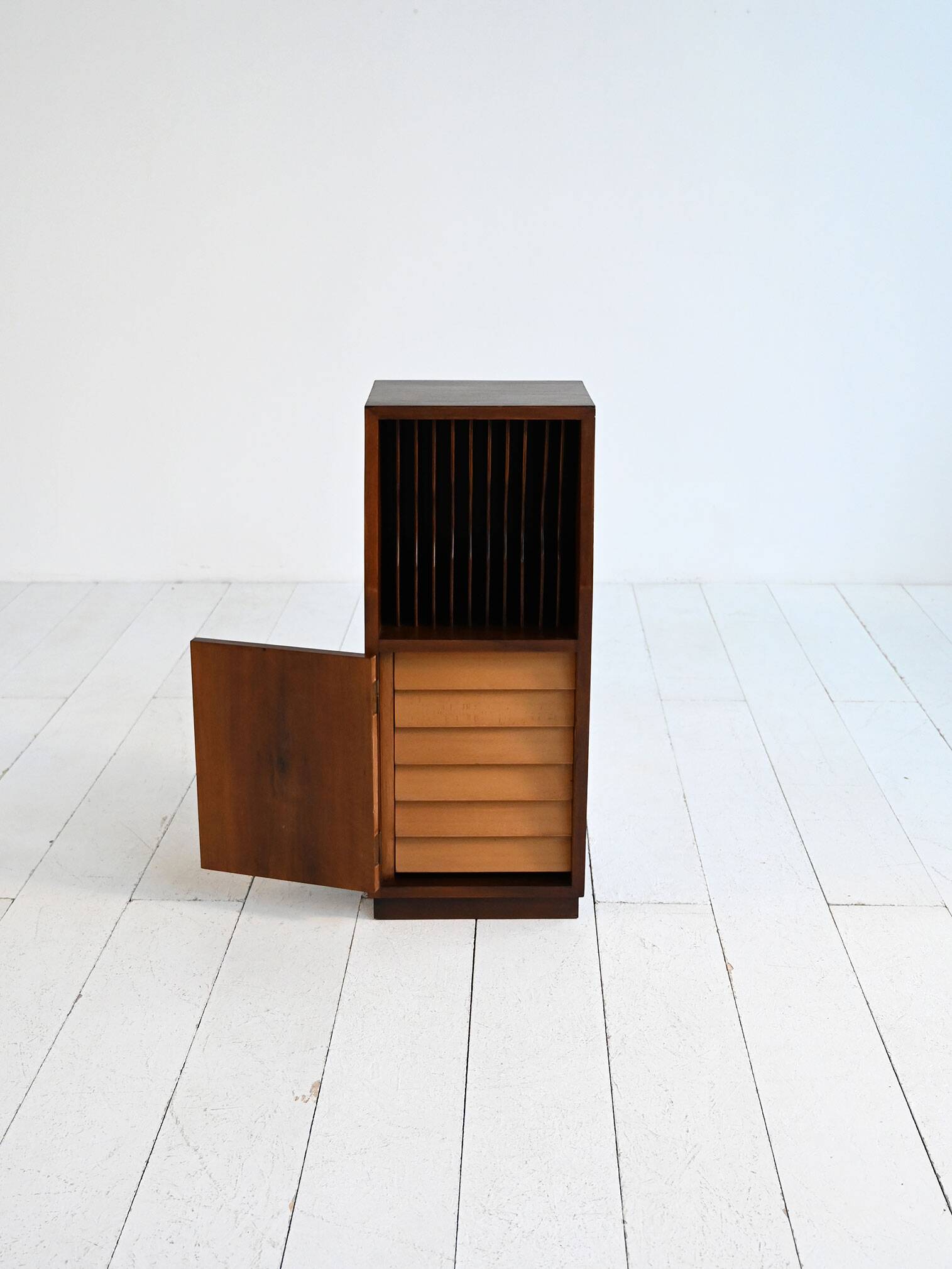 Cabinet with vinyl storage compartment