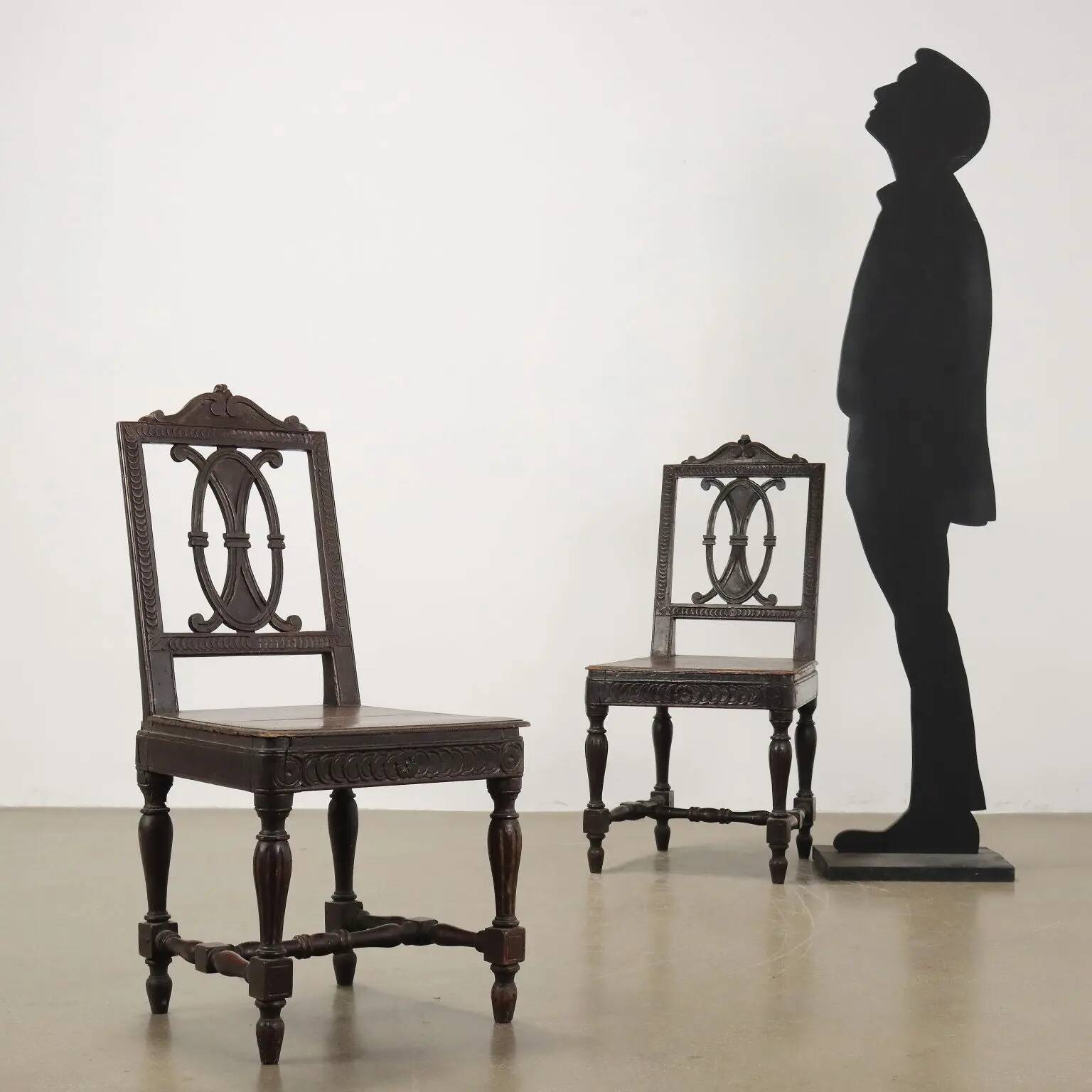 Antique neoclassical chairs in carved walnut, Italy, 18th century