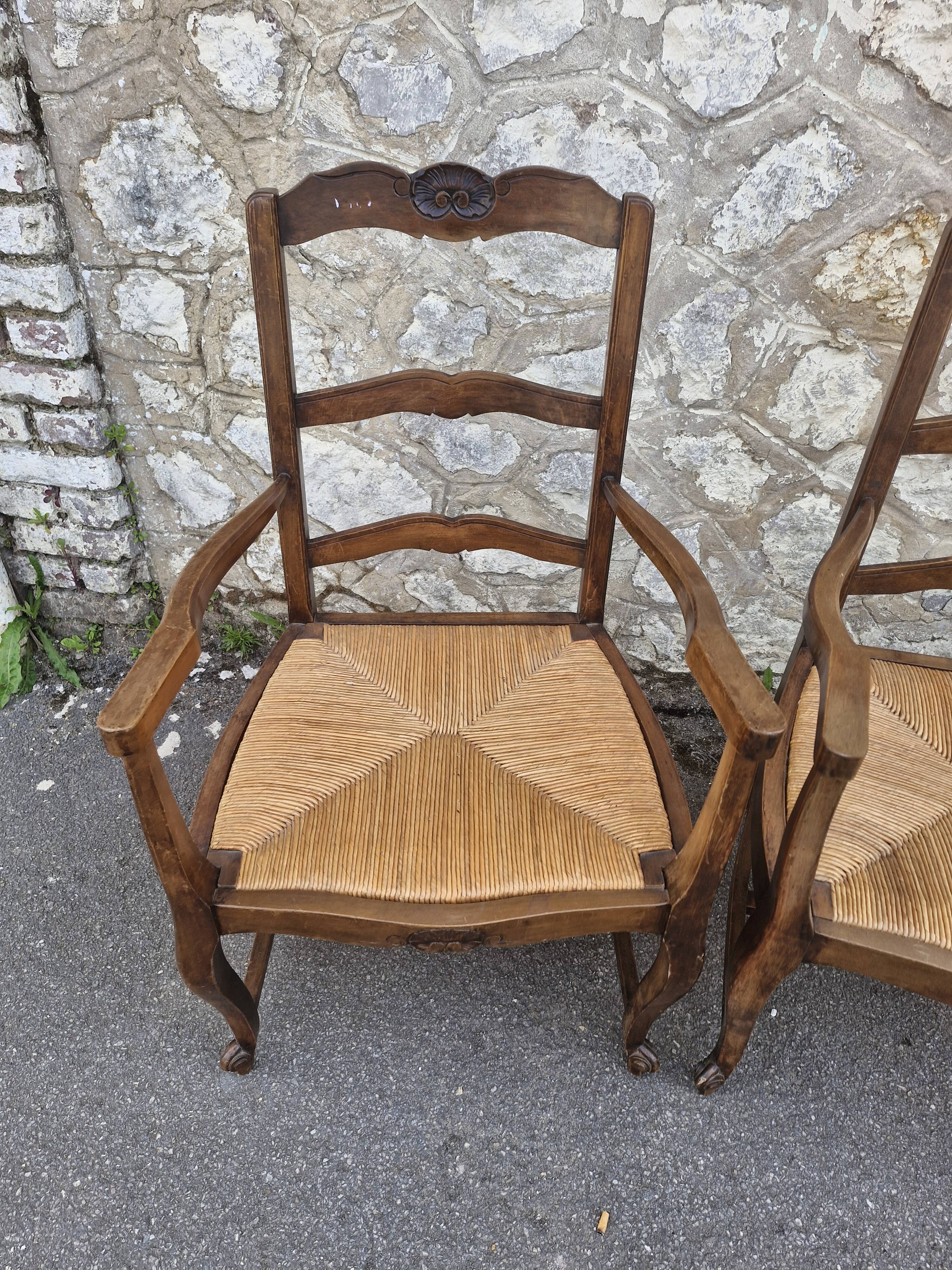Wood and straw armchairs