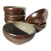 6 iridescent brown sandstone bowls inside grey