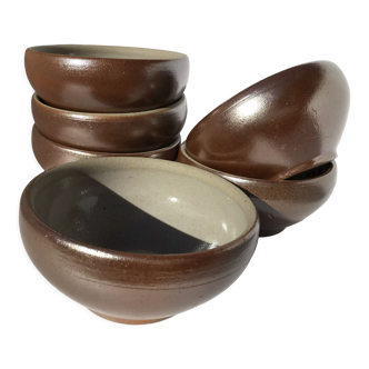 6 iridescent brown sandstone bowls inside grey