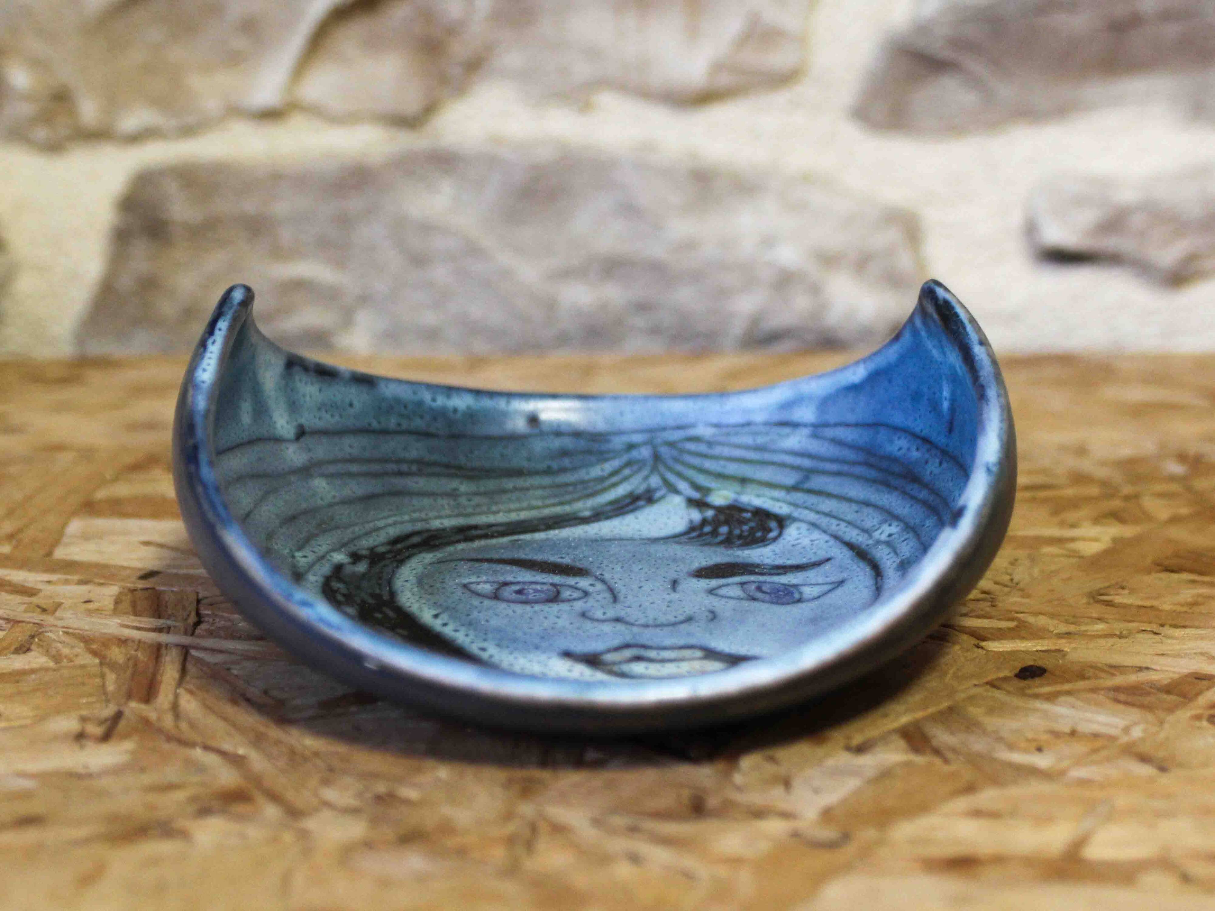 Ceramic catchall with face design