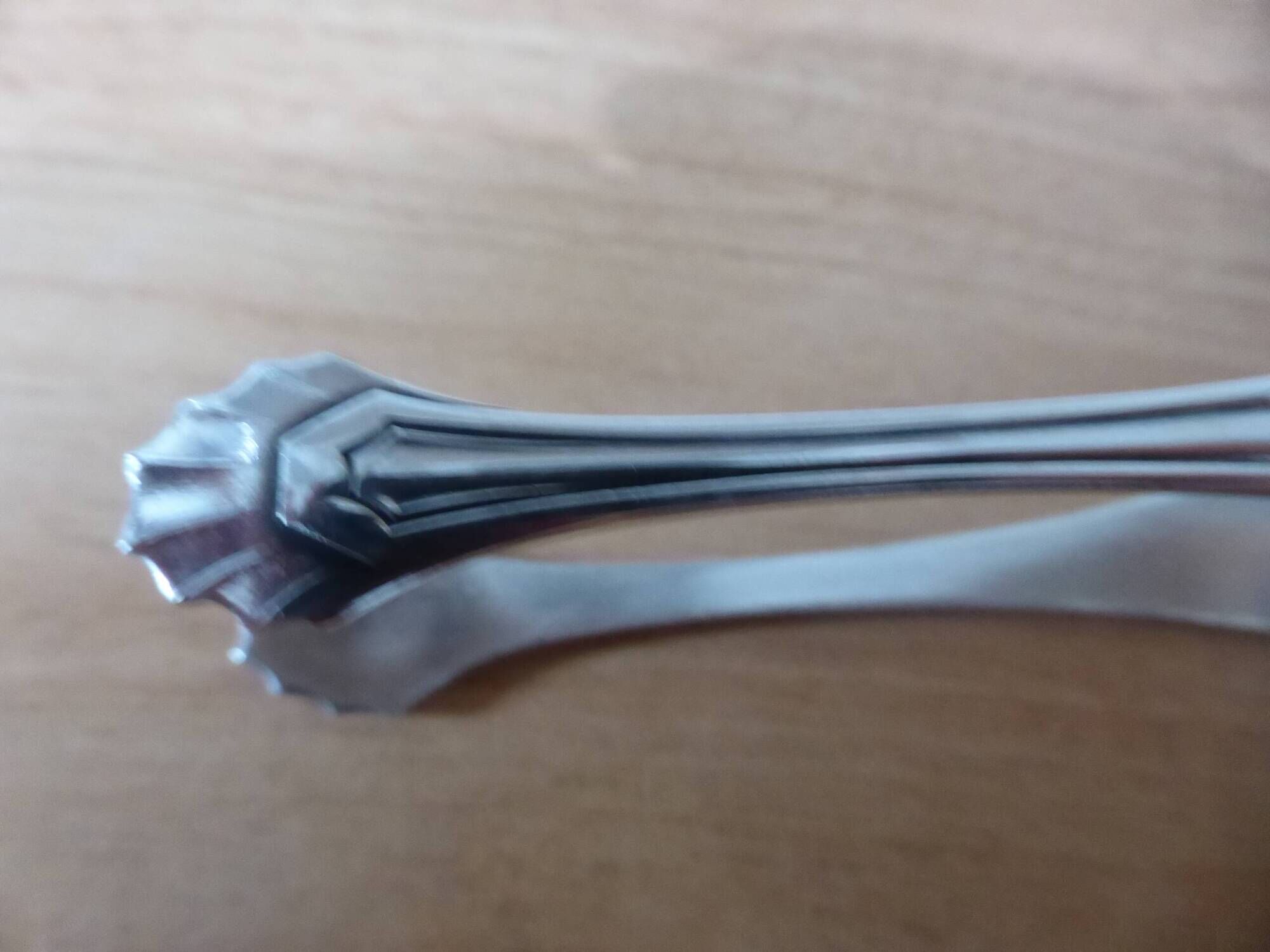 vintage silver metal sugar tongs