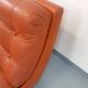 Vintage Roche Bobois armchair in chrome and terracotta leather.