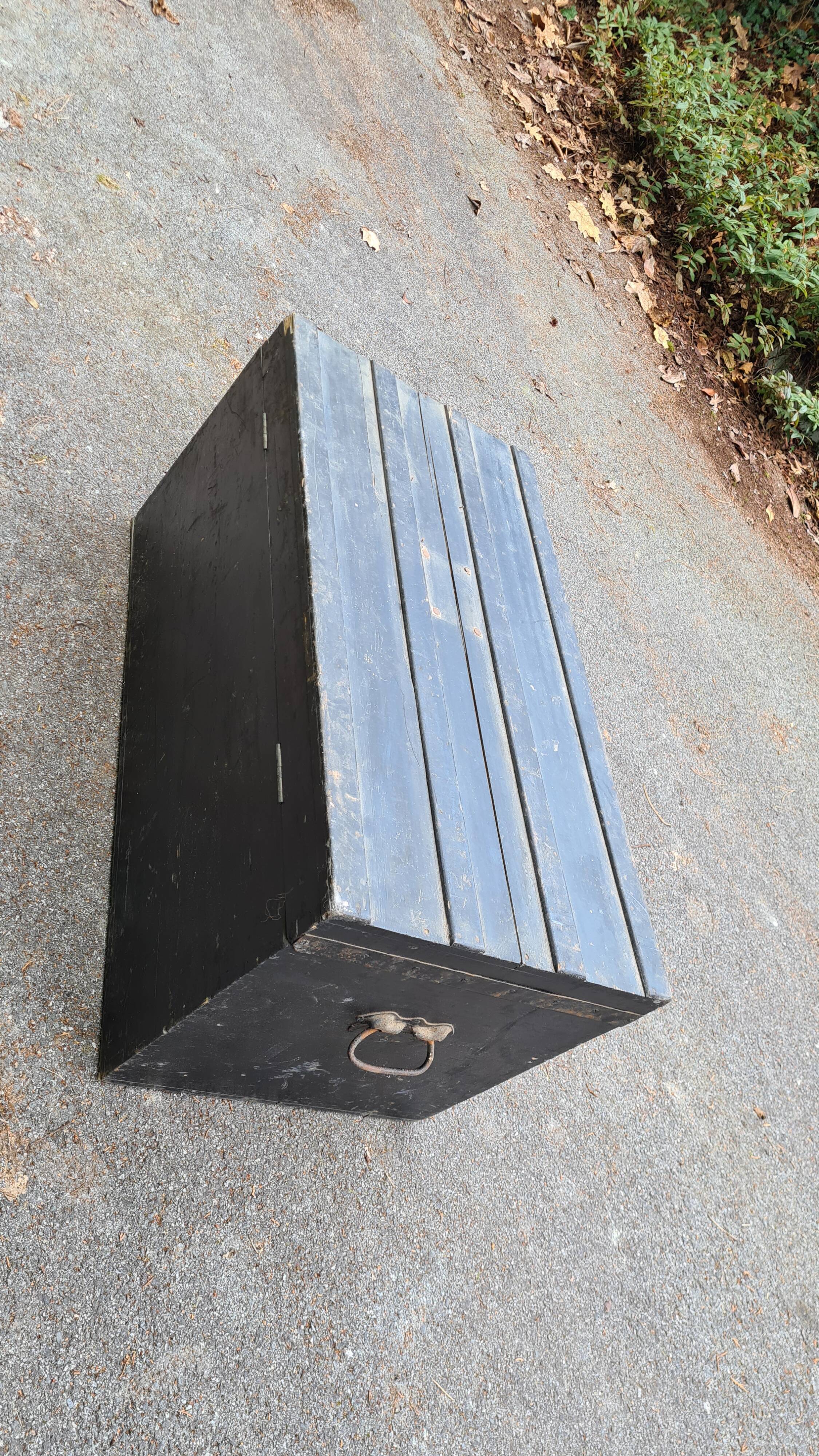 Old wooden trunk with interior compartments