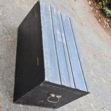 Old wooden trunk with interior compartments