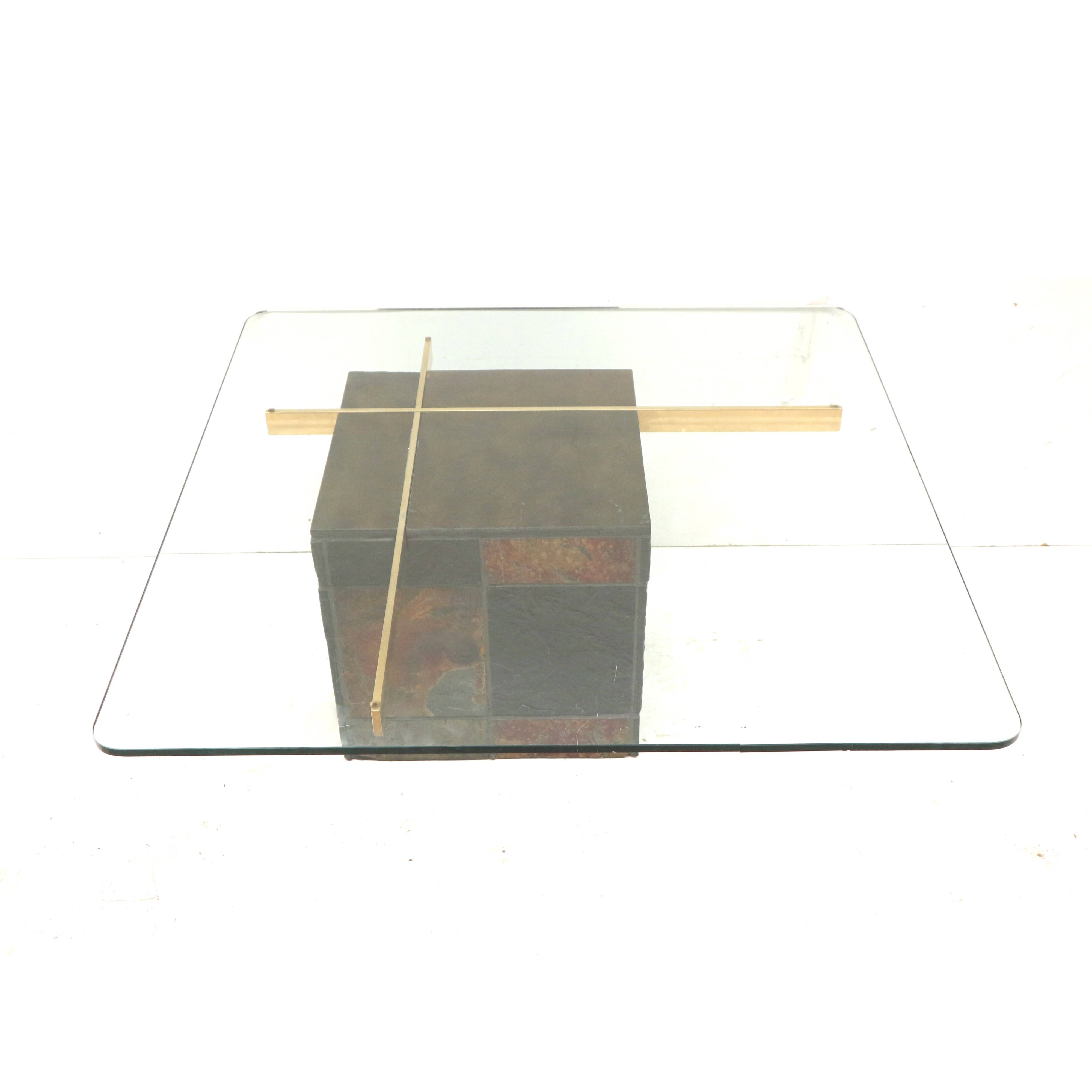 Italian design coffee table by Artedi with natural stone base and glass top