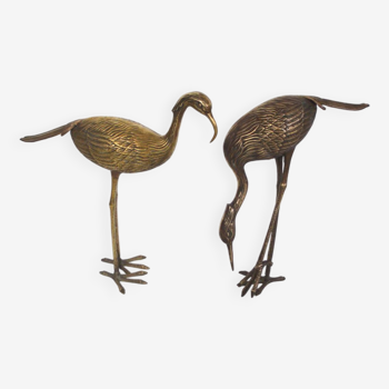 Couple of brass herons