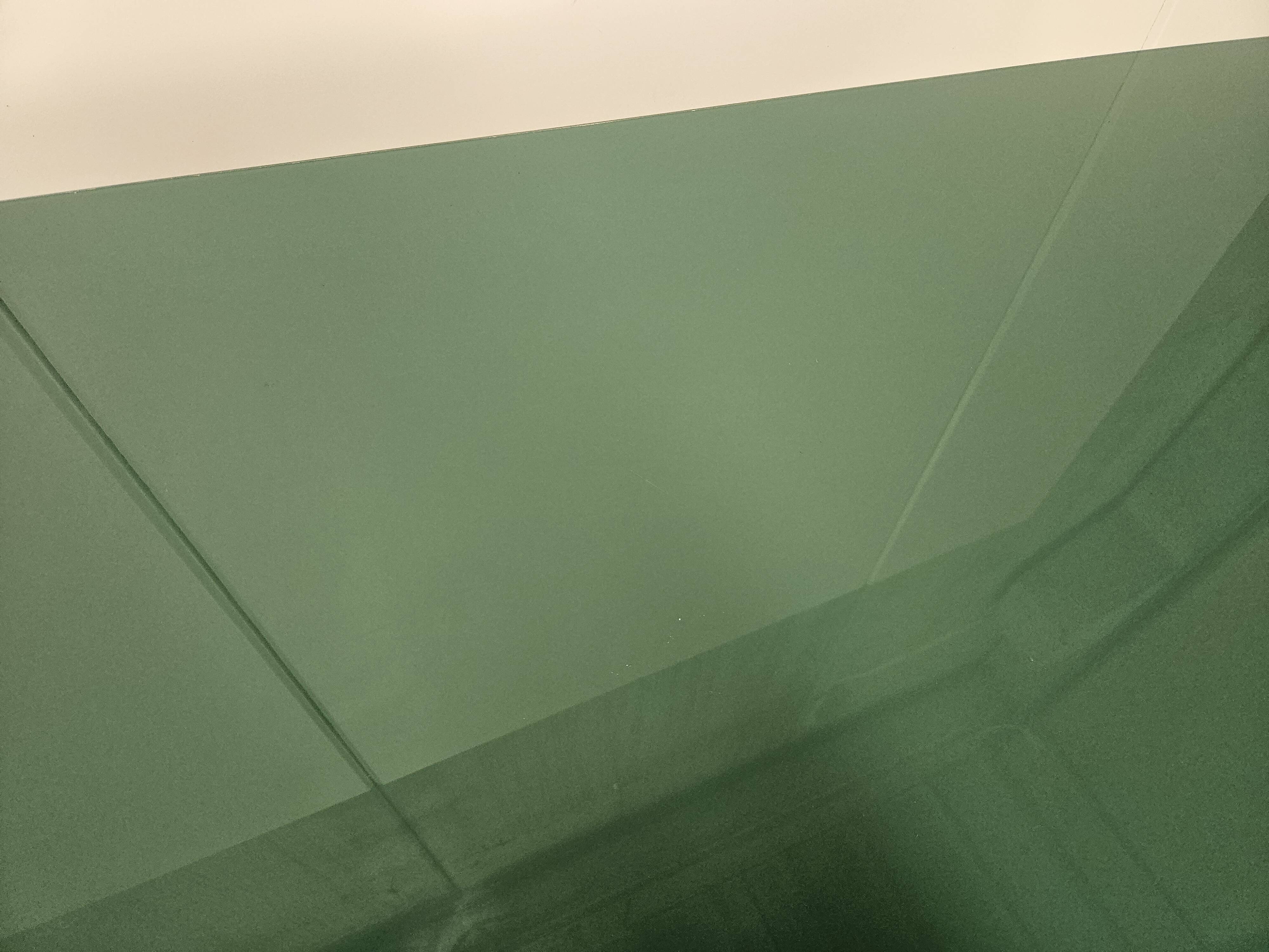 Mid-century mahogany dining table with aquamarine glass top