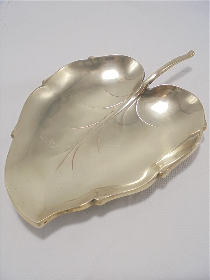 Brass pocket emptier