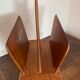 Magazine rack, in oak, by Pierre Cruège