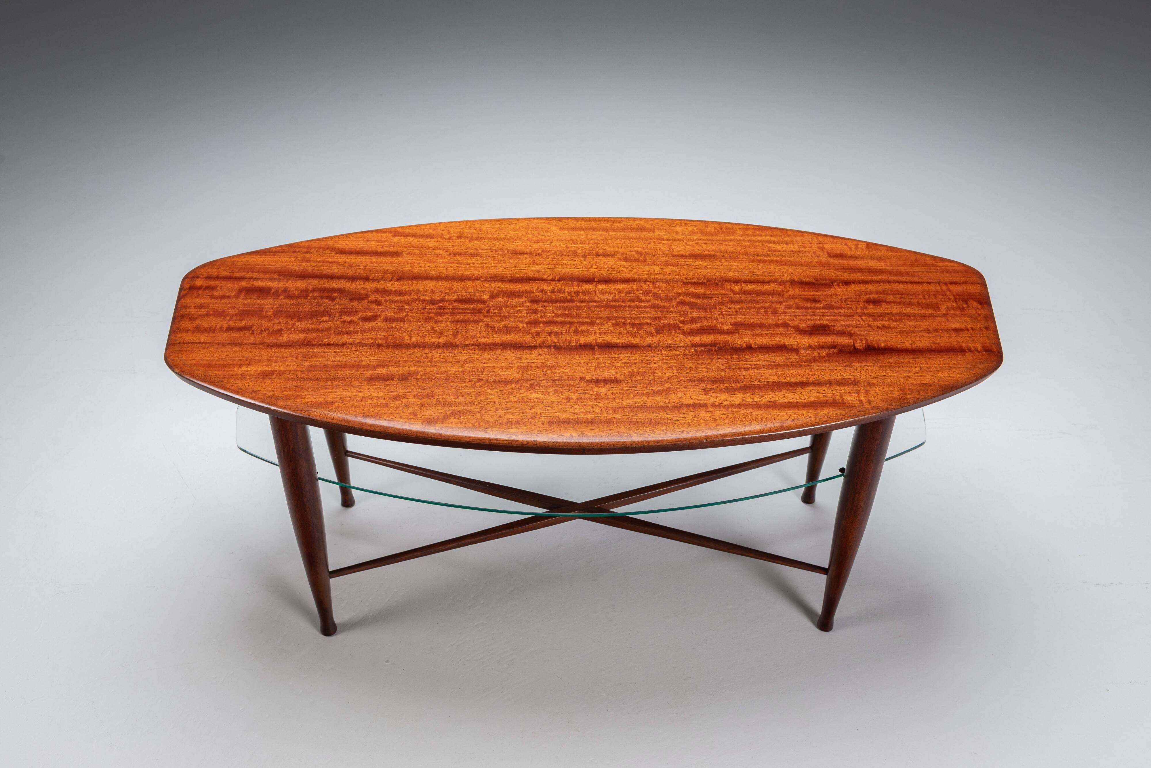 Assymetrical coffeetable with glass storage and cross leg details